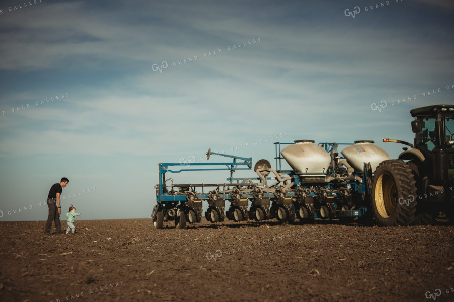 Farmer with Daughter and Planter 4205
