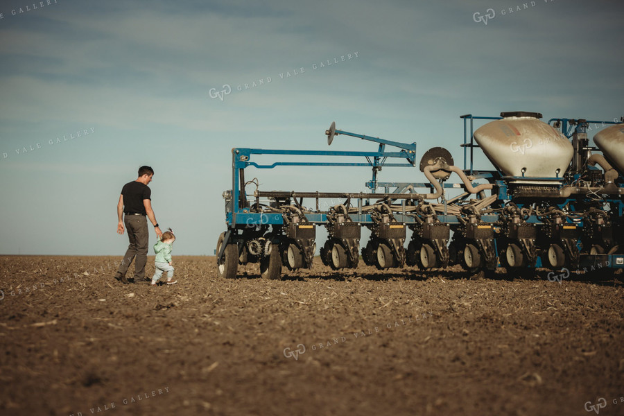 Farmer with Daughter and Planter 4206
