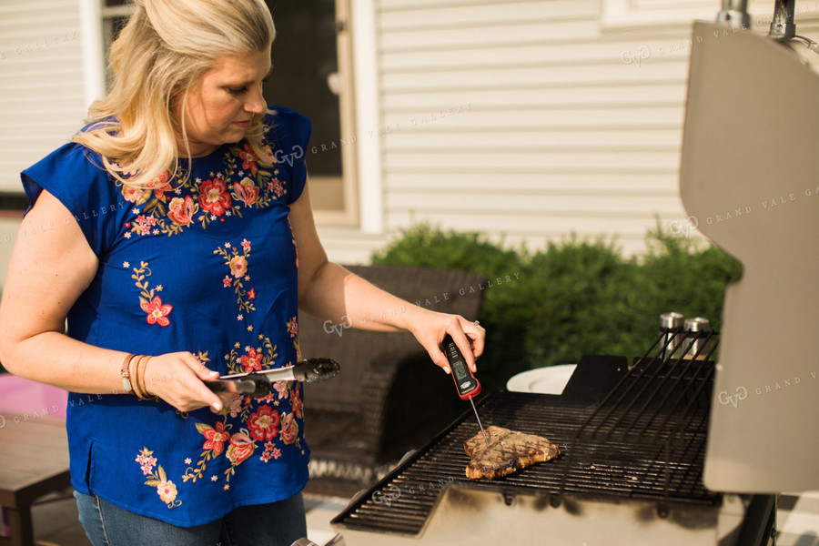 Farm Wife Grilling Steak Checking Temperature 4421