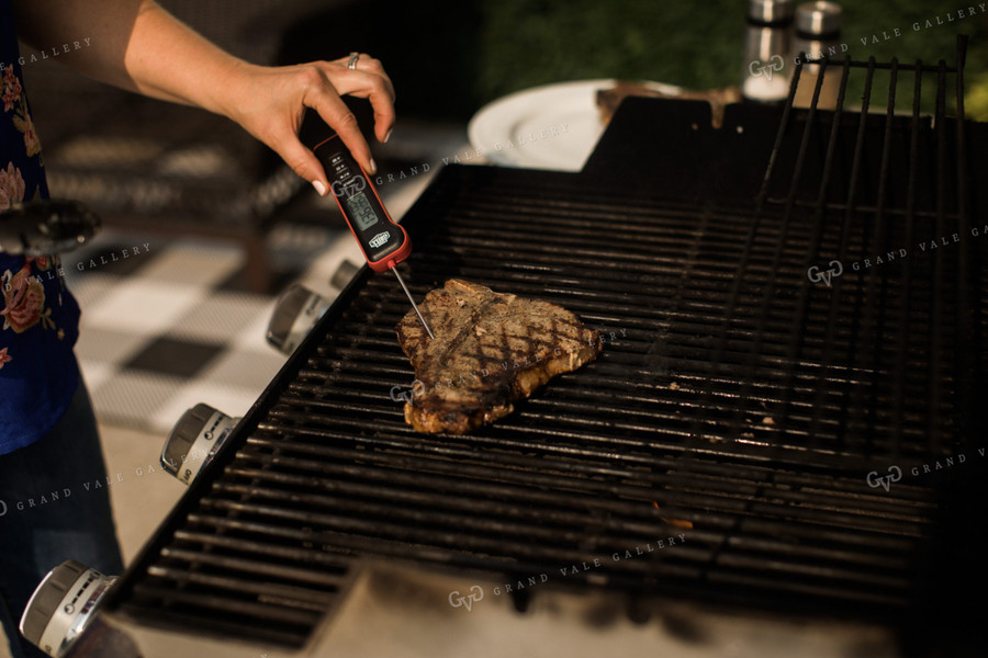 Farm Wife Grilling Steak Checking Temperature 4422