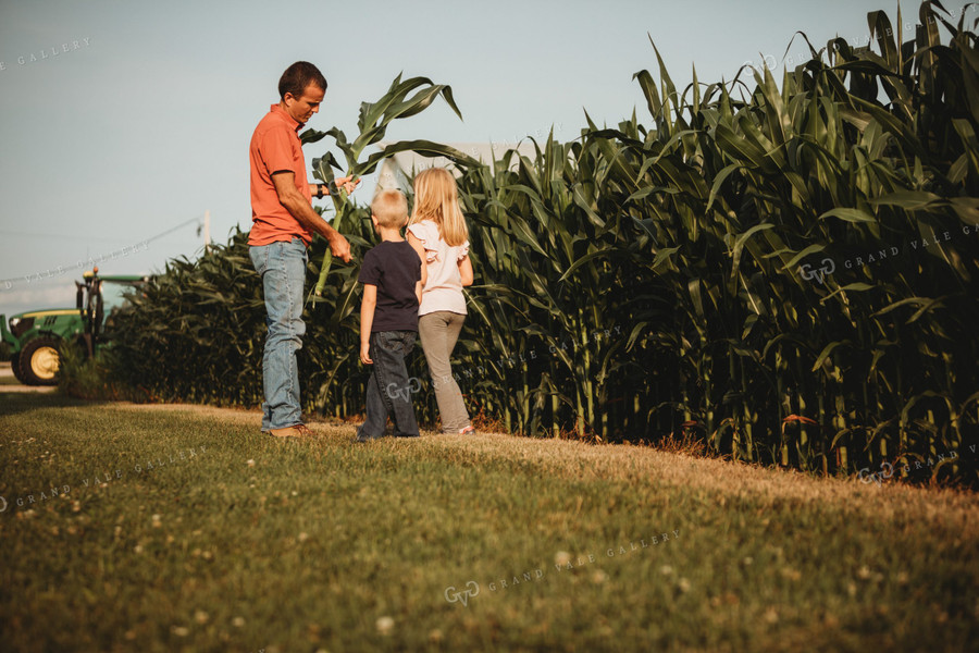Farmer and Farm Kids Checking Corn Crop 4500