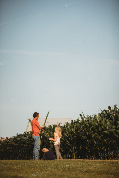 Farmer and Farm Kids Checking Corn Crop 4503