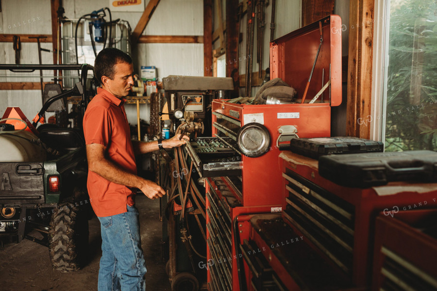 Farmer Getting Tools inside Farm Shop 4512