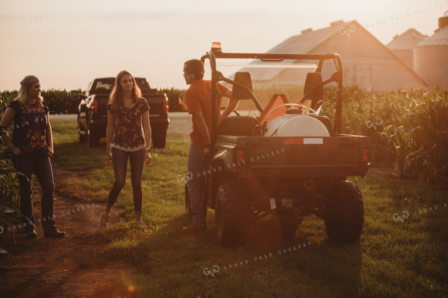 Farmer with UTV Corn Field and Family 4559