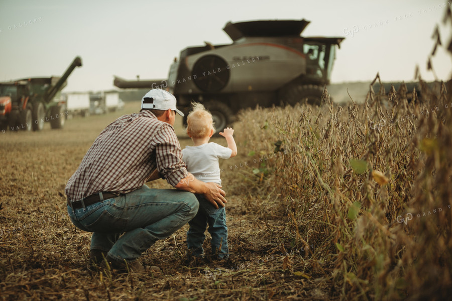 Farmer and Farm Kid Watching Combine 4821