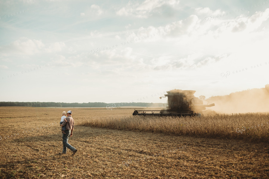 Farmer and Farm Kid Getting into Combine 4827