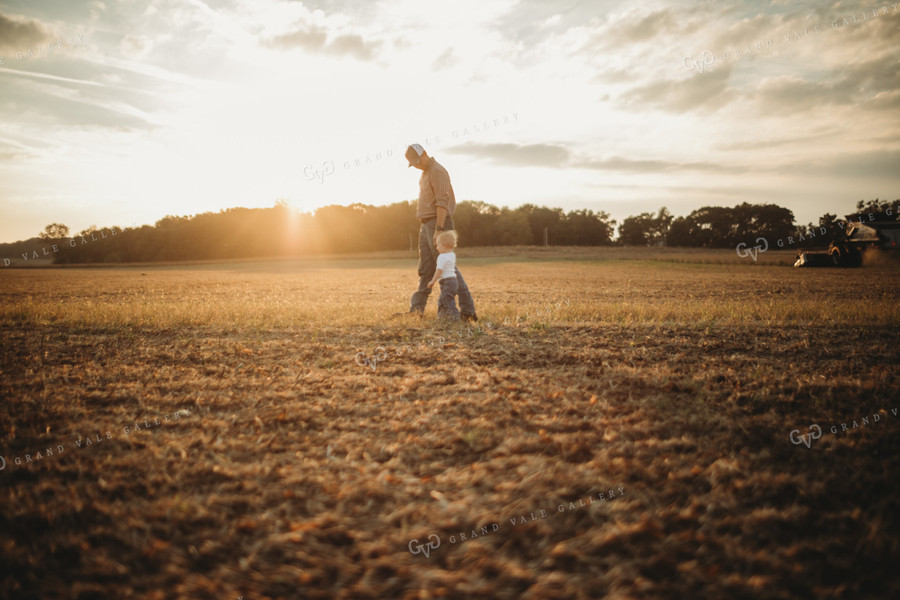 Farmer and Farm Kid Walking to Truck 4871