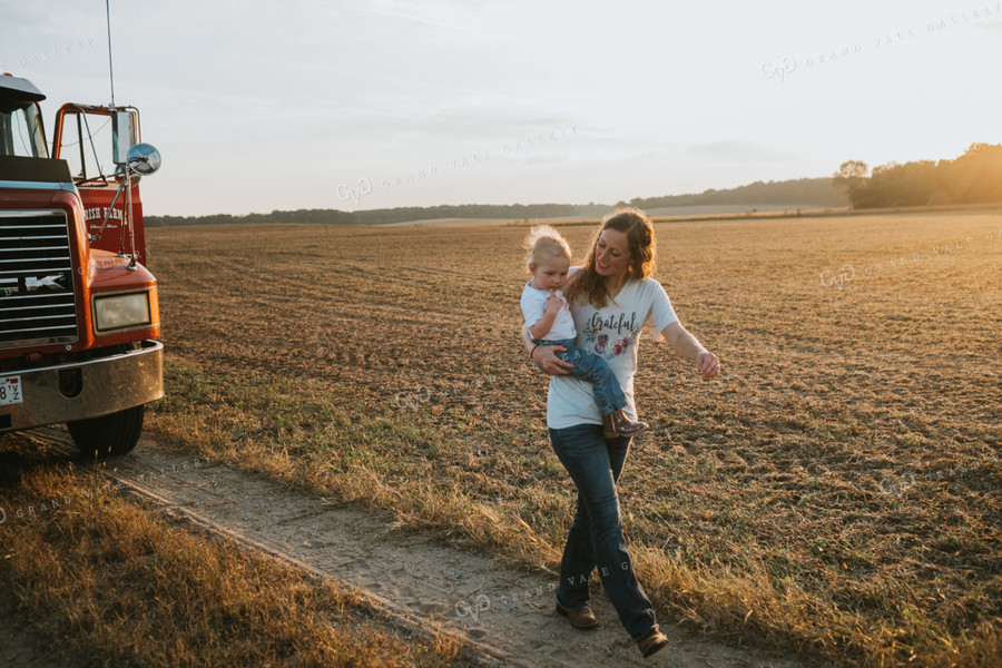 Farmer and Farm Kid Walking away from Truck 4875