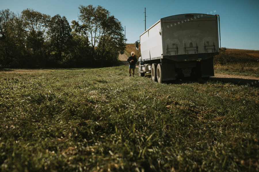 Female Farmer Getting out of Farm Truck 5236