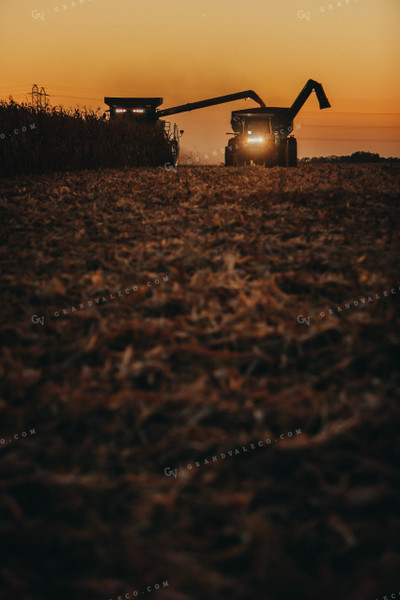 Combine and Auger Cart Harvesting Corn Field 5249