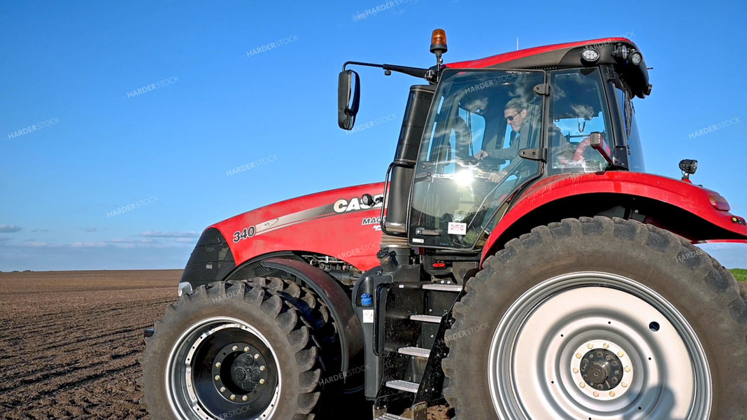 Farmer Climbing into Cab 25226