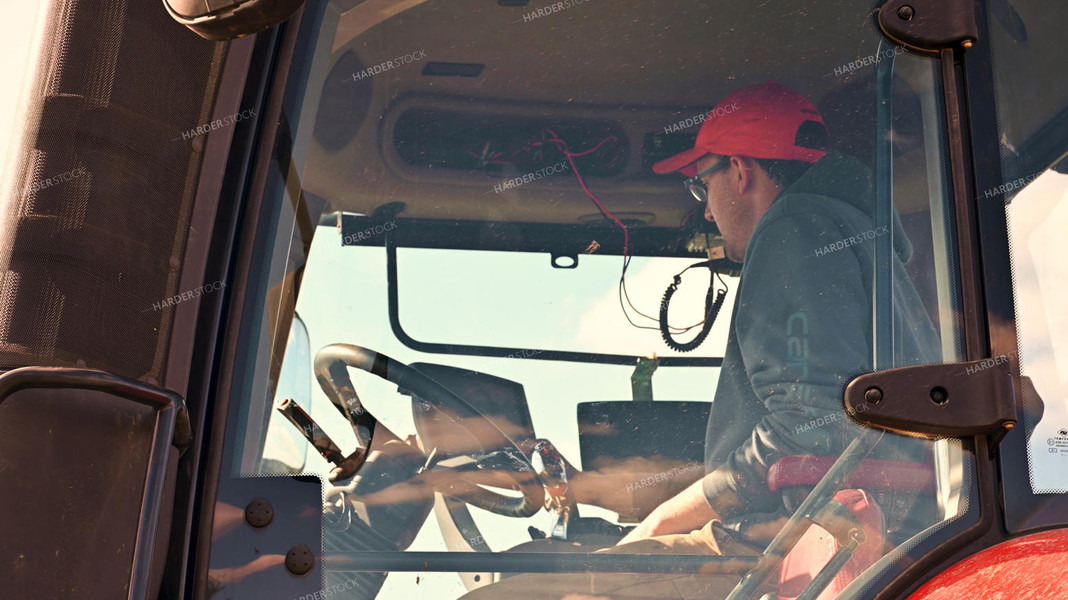 Farmer in Tractor Cab 25230