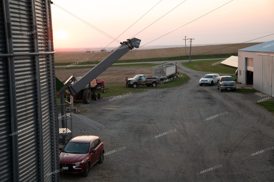 It Takes a Village - Vehicles Parked at Grain Bin Site during Harvest 25794