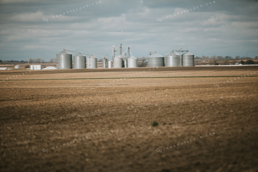 Unplanted Field in Spring with Grain Bins 5405