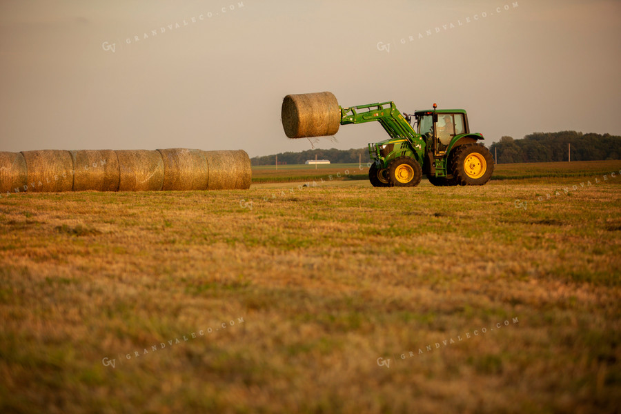 Tractor Lifting Round Hay Bale 5522