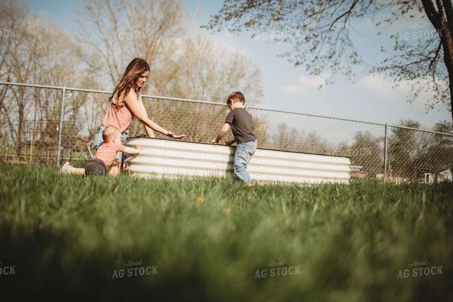 Farm Mom with Kids in Garden 5576