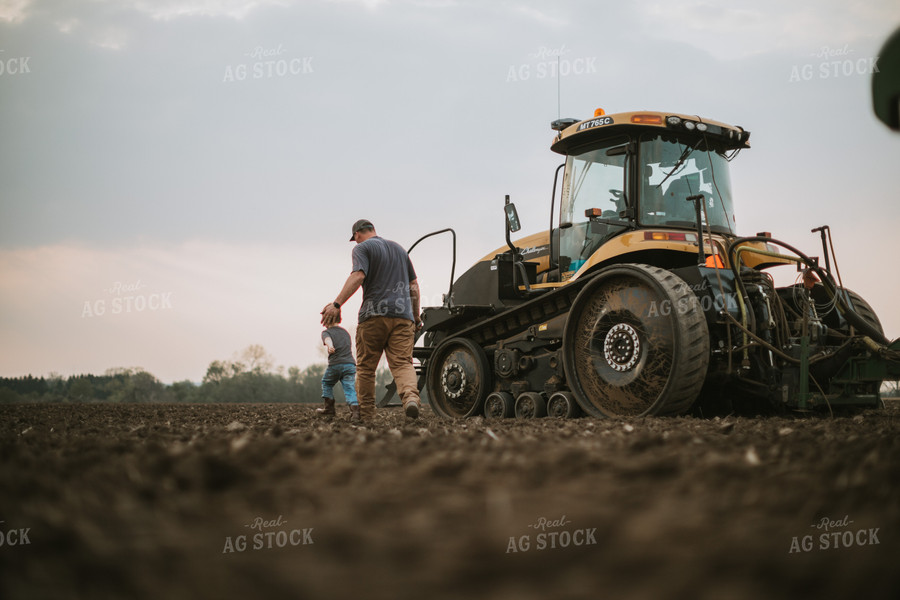 Farmer Walking Toward Planter Tractor with Farm Kid 5665