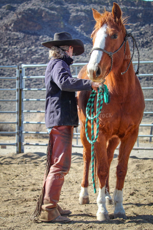 Female Rancher and Horse 78029
