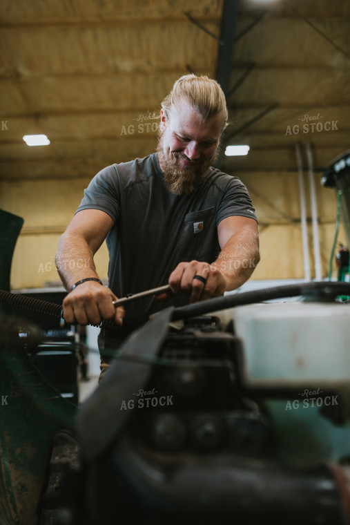 Farmer Working in Shed 6002
