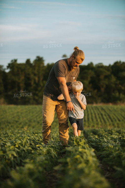 Farmer and Farm Kid in Soybean Field 6005