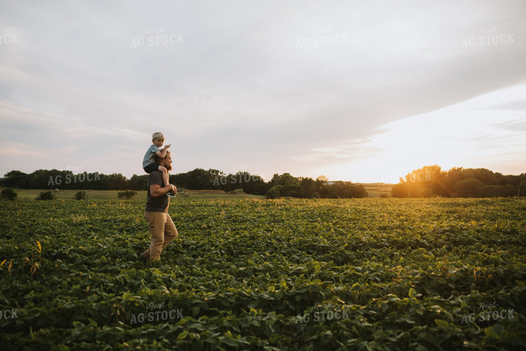 Farmer and Farm Kid in Field 6019