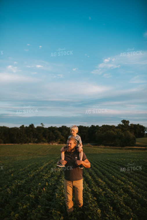 Farmer and Farm Kid in Field 6022