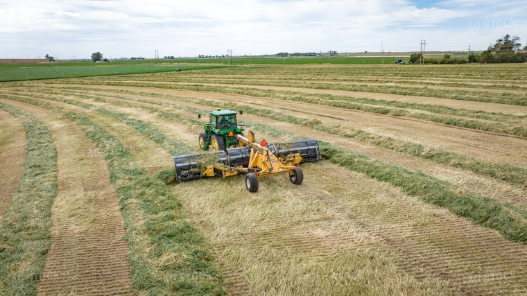 Tractor with Merger in Hay Field 56413