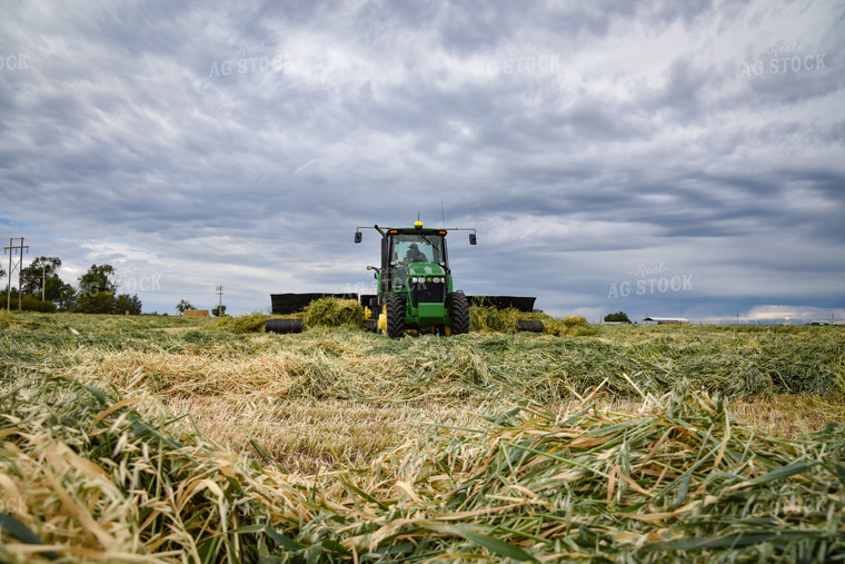 Tractor with Merger in Hay Field 56426