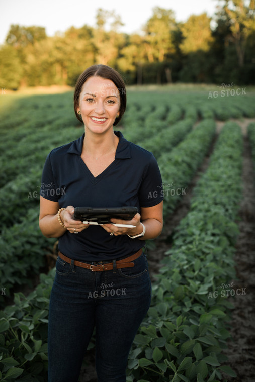 Agronomist or Farmer in Soybean Field with Tablet 6097