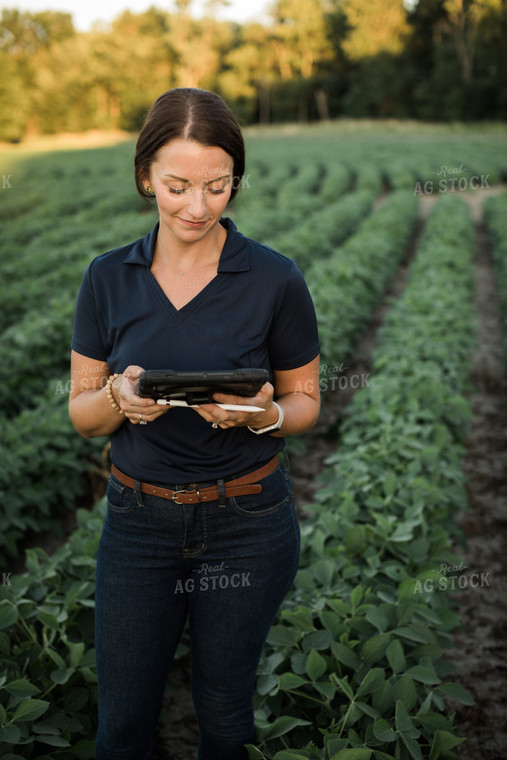 Agronomist or Farmer in Soybean Field with Tablet 6098