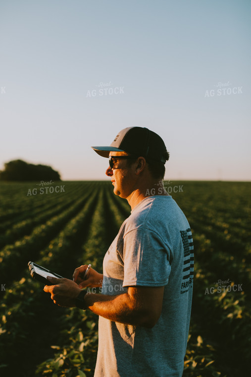 Farmer in Soybean Field with Tablet 6144