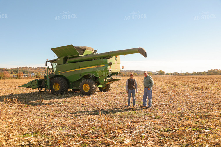 Farmers Talking Outside of Combine During Corn Harvest 52483