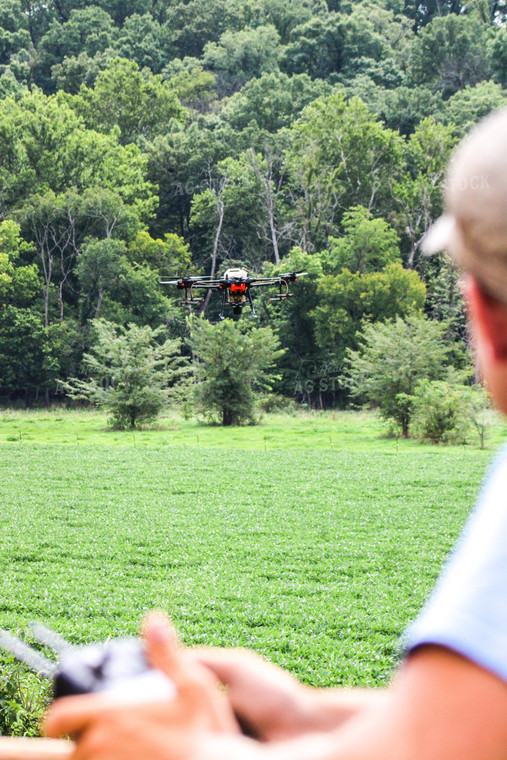 Farmer Holding Drone Remote 101023