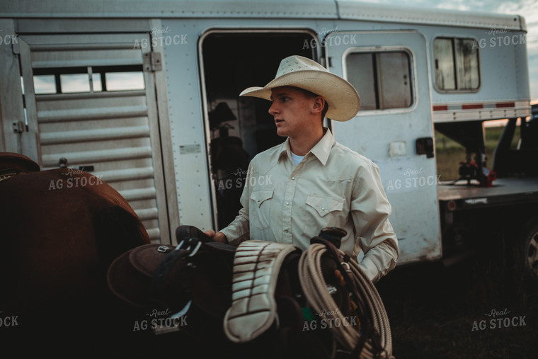 Rancher with Horses Near Livestock Trailer 6440