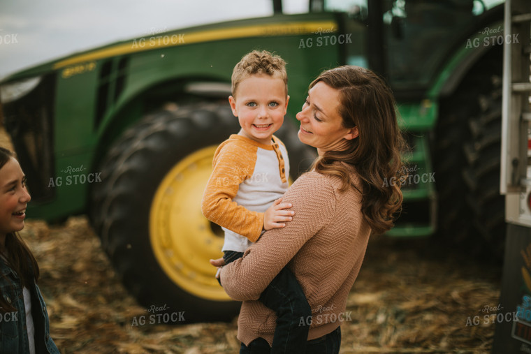 Farm Family Near Tractor 6601