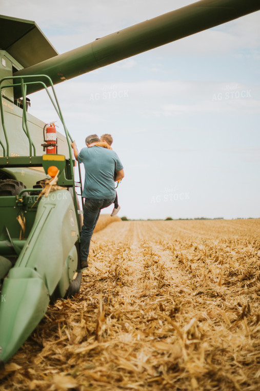 Farm Kid and Farmer Getting Out of Combine 6607