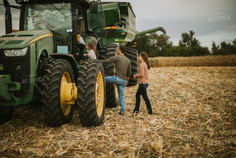 Farm Family Getting in Tractor 6627