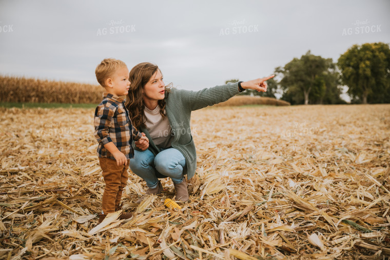 Farmer and Farm Kid in Field 6633
