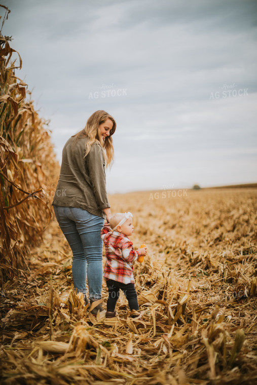 Farmer and Farm Kid in Field 6677
