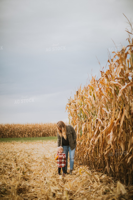 Farmer and Farm Kid in Field 6678