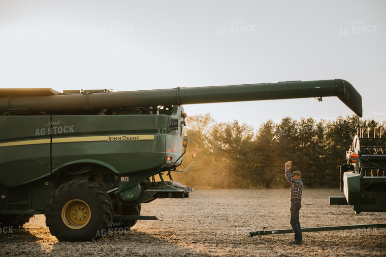 Farmer with Combine and Head 6742