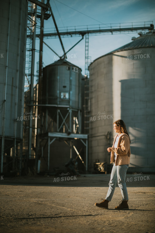 Farmer Walking in Yard 6838