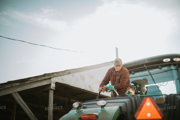 Farmer Fueling Tractor 6841