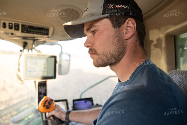 Farmer in Combine 52563