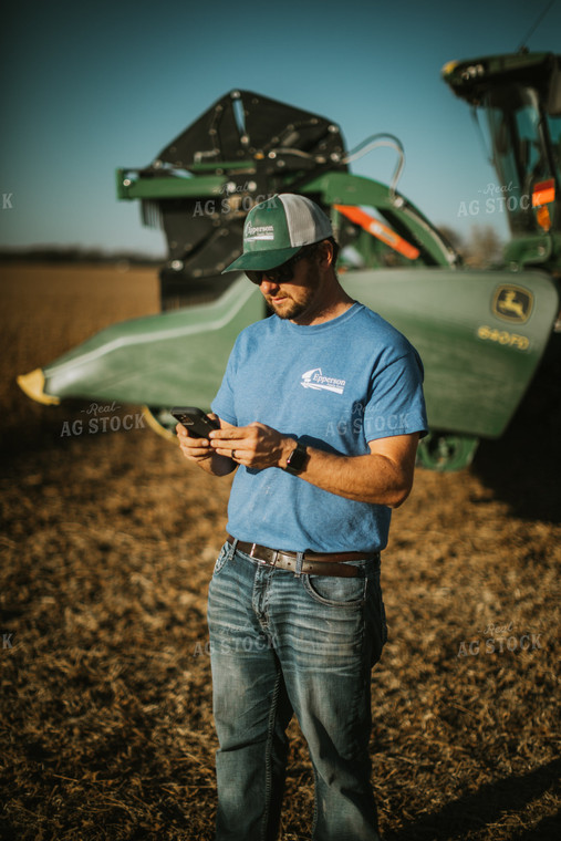 Farmer on Phone in Field 7133