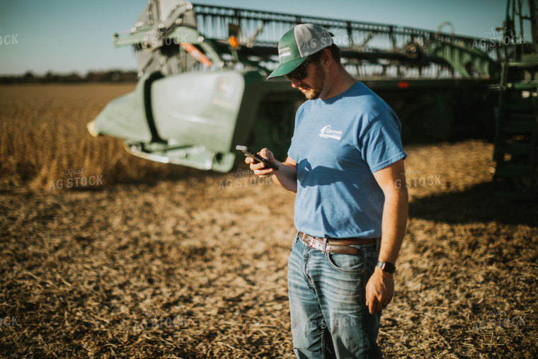 Farmer on Phone in Field 7137