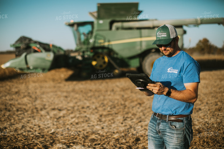 Farmer in Field With Tablet 7152