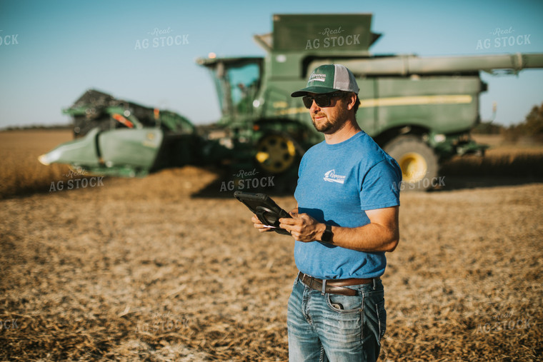 Farmer in Field With Tablet 7156