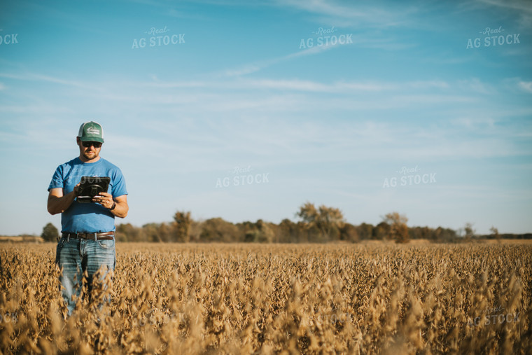 Farmer in Field with Tablet 7170