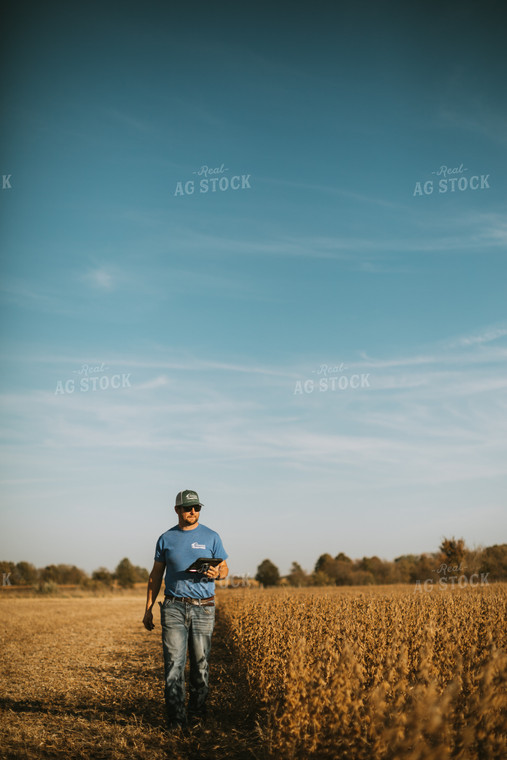 Farmer in Field with Tablet 7180